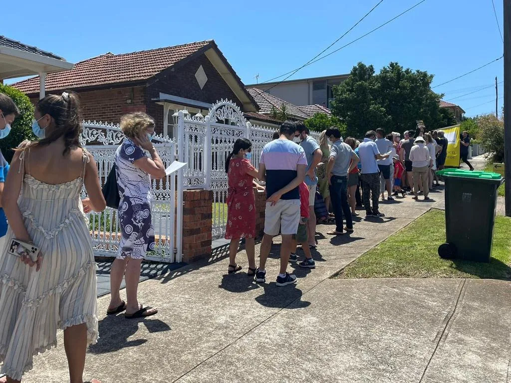 Crowds queuing for a property inspection in Sydney
