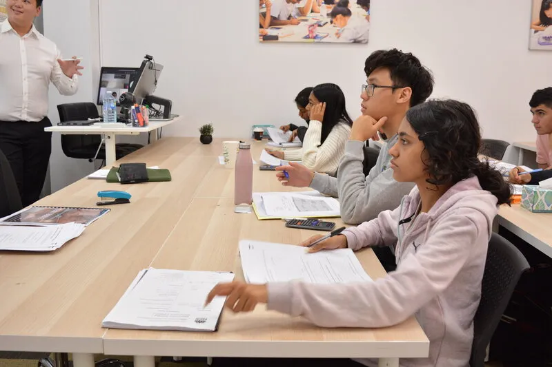 Uplift Education classroom session at their Liverpool campus with students and mentor