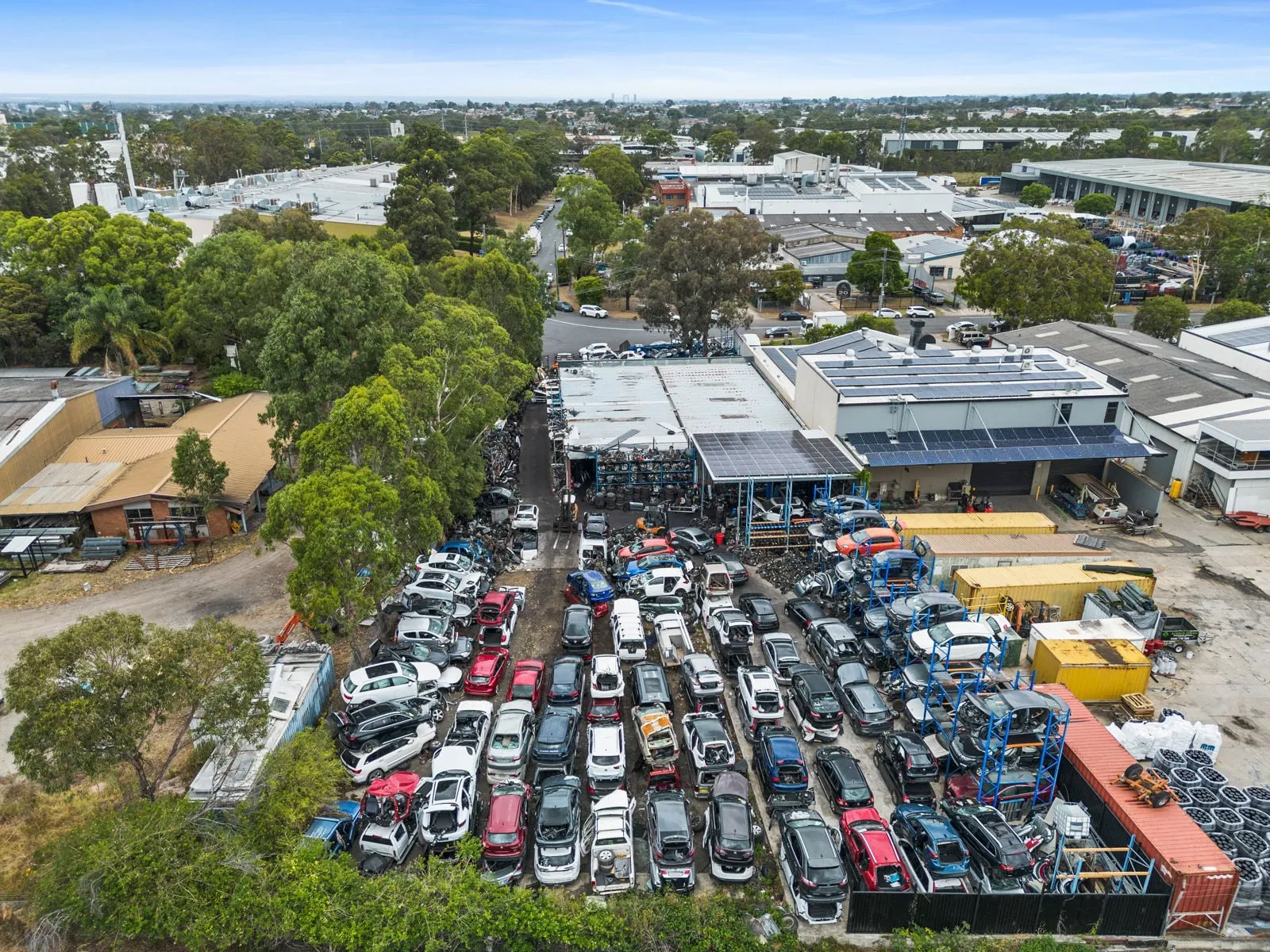 Aerial view of a typical Wetherill Park industrial business showing warehouses, vehicles, and operations